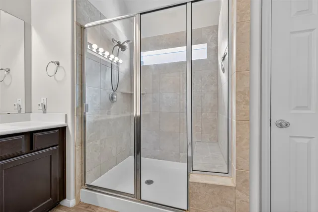 a bed room with a bed and a window