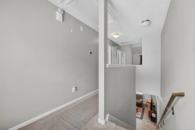 a bathroom with a sink double vanity granite tub shower and a mirror