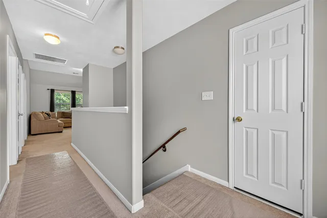 a view of a hallway with workspace