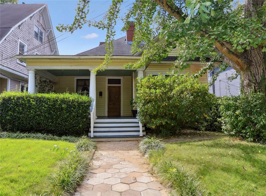 1087 Colquitt Avenue Northeast Atlanta, GA 30307 - Photo 1 of 1 a view of a house with a garden