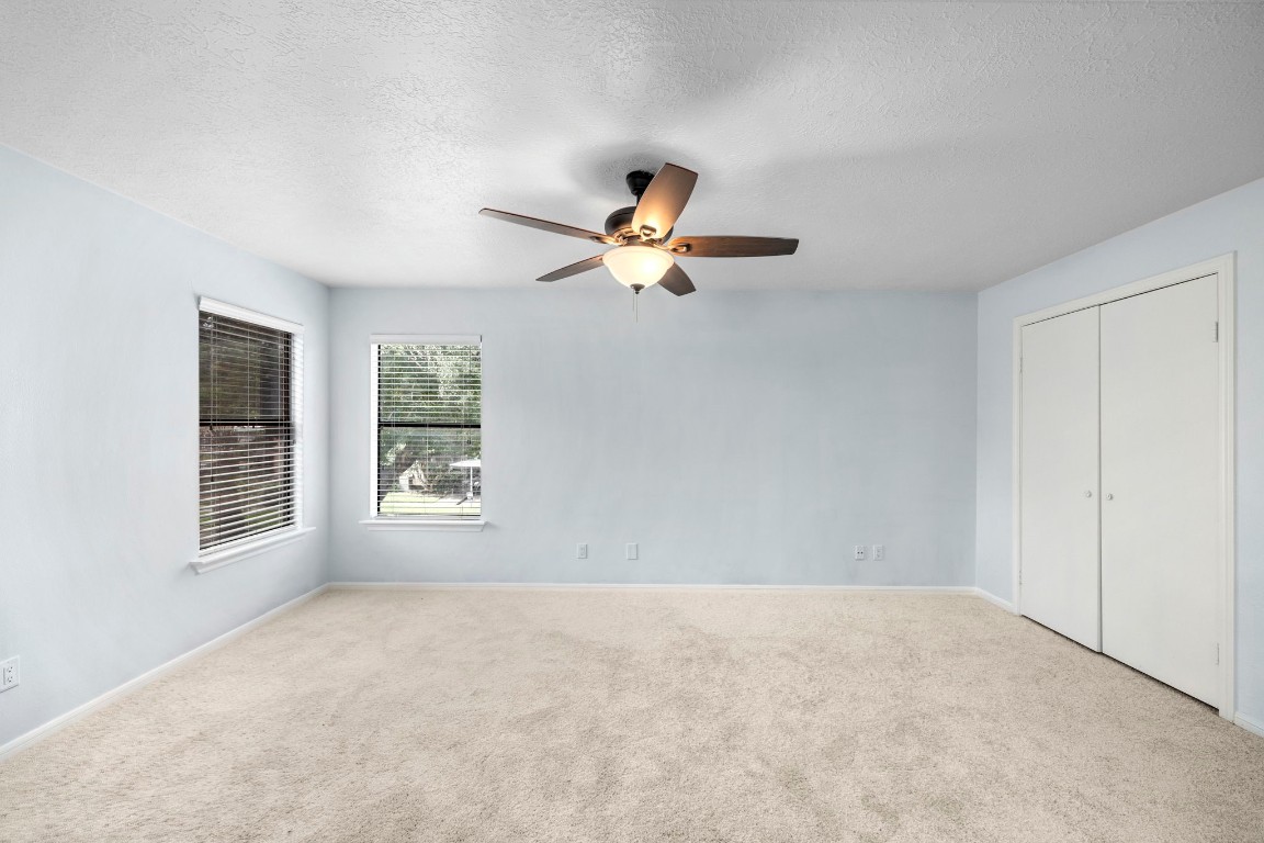 12755 Mill Ridge Drive, Unit 301 Cypress, TX 77429 - Photo 15 of 24 a view of an empty room with a window