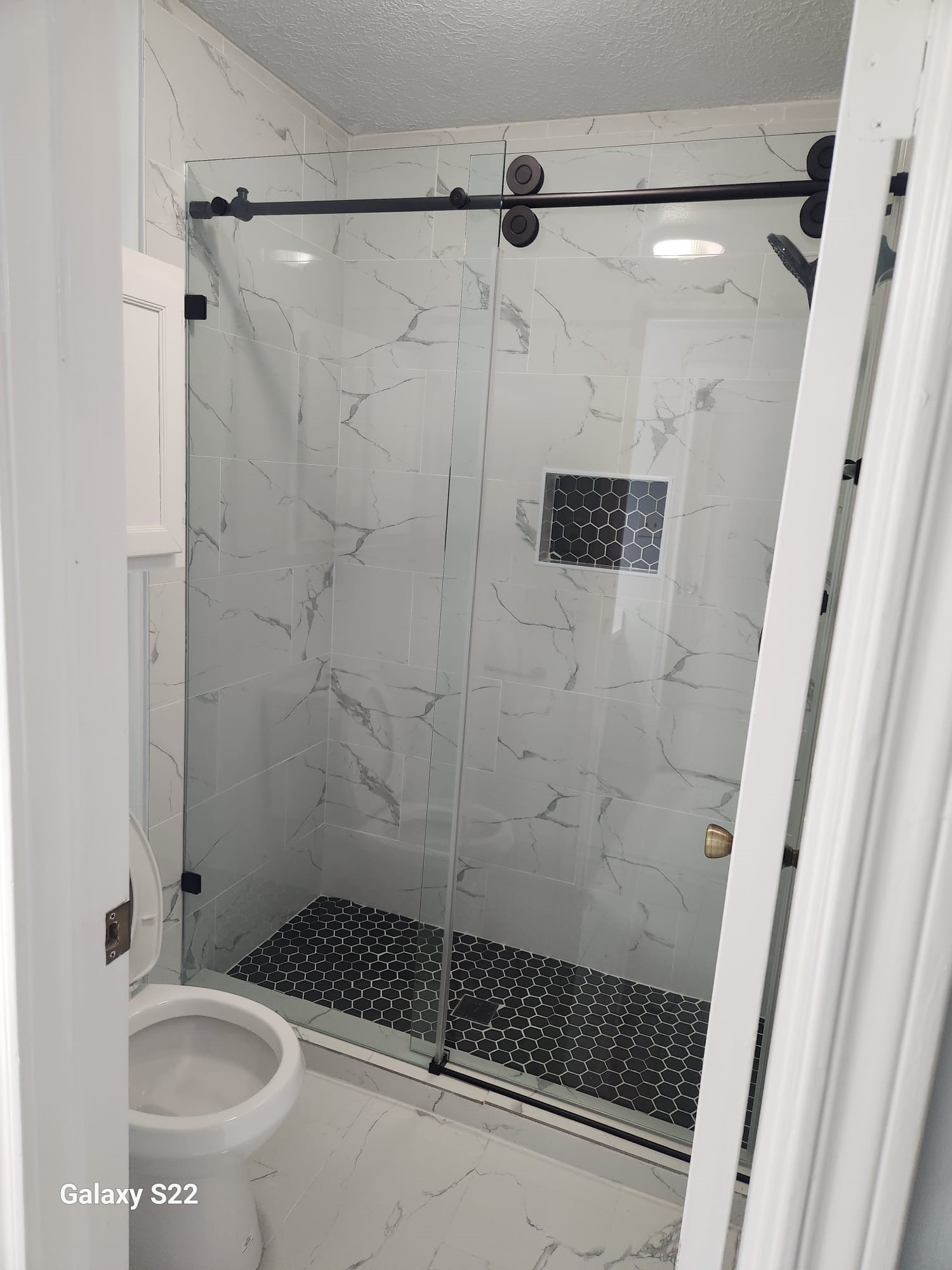 12755 Mill Ridge Drive, Unit 301 Cypress, TX 77429 - Photo 19 of 24 a bathroom with a shower and a sink