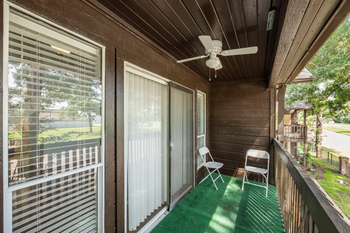 12755 Mill Ridge Drive, Unit 301 Cypress, TX 77429 - Photo 22 of 24 a view of a house with a porch