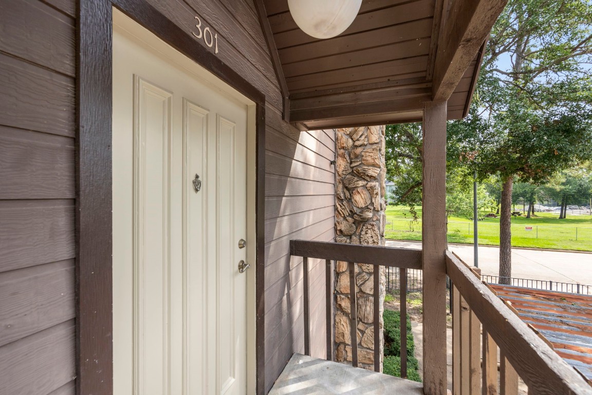 12755 Mill Ridge Drive, Unit 301 Cypress, TX 77429 - Photo 3 of 24 a view of a porch