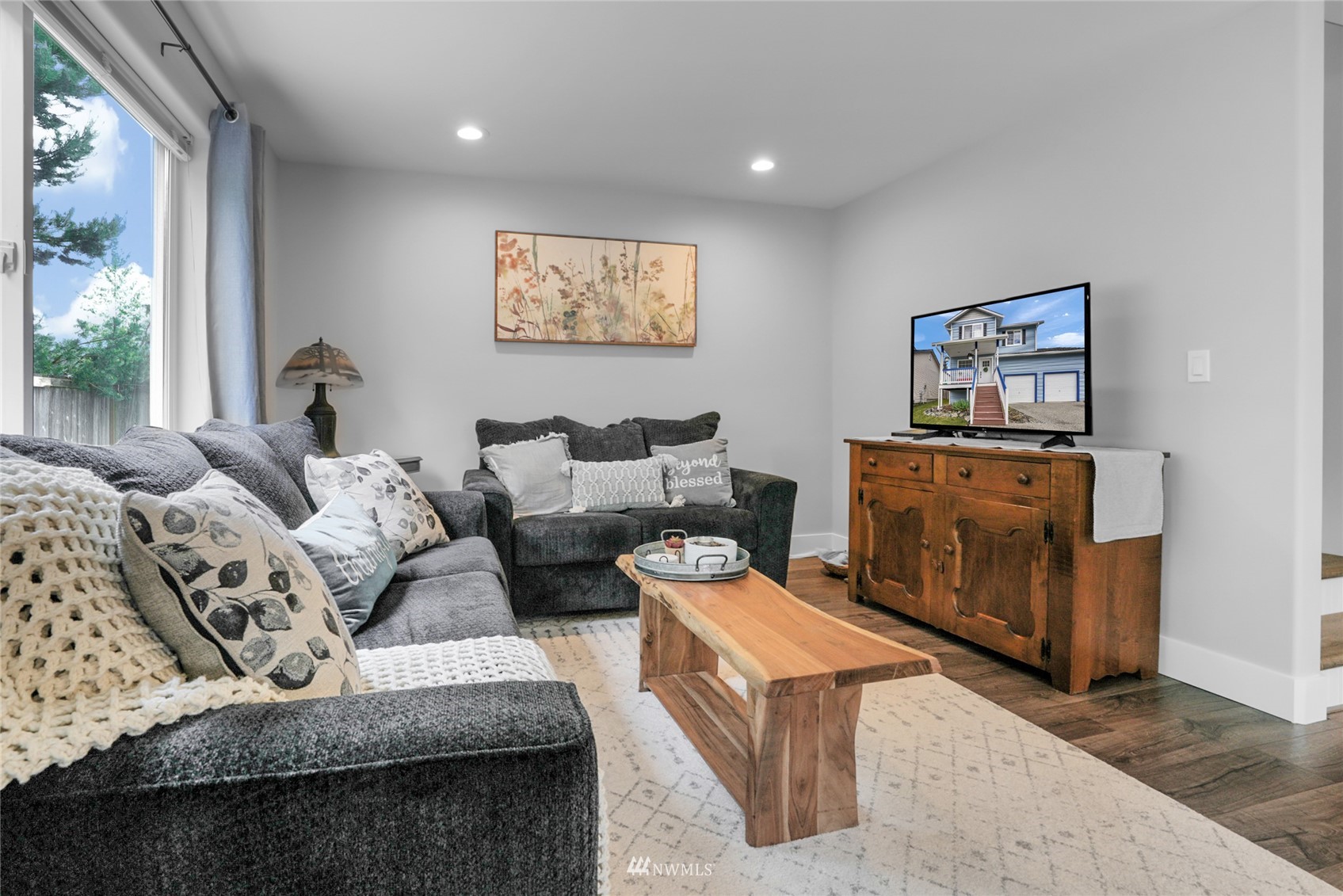 19303 Crown Ridge Boulevard Arlington, WA 98223 - Photo 15 of 30 a living room with furniture and a painting