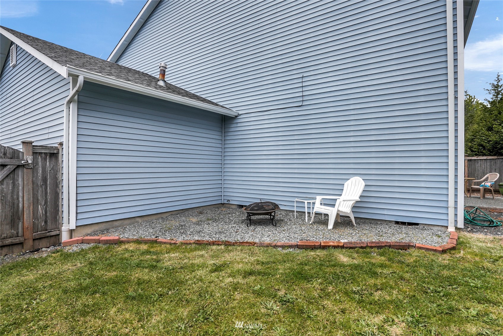 19303 Crown Ridge Boulevard Arlington, WA 98223 - Photo 29 of 30 a backyard view of a house