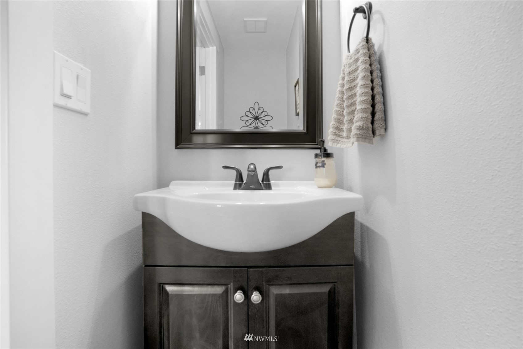 19303 Crown Ridge Boulevard Arlington, WA 98223 - Photo 8 of 30 a bathroom with a sink and a mirror