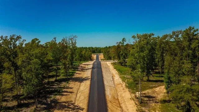 a view of a playground with basketball court