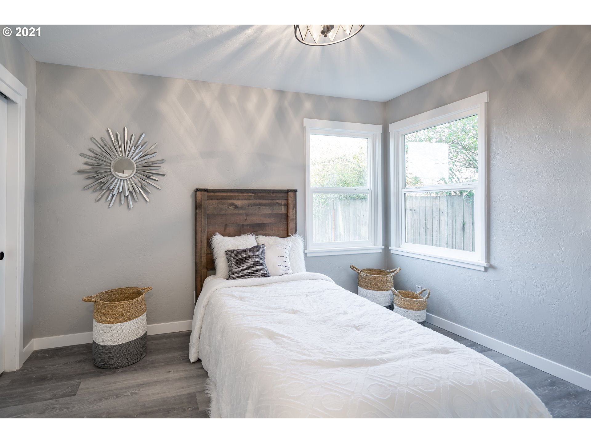 1214 L Street Springfield, OR 97477 - Photo 16 of 24 a bedroom with a bed and a window