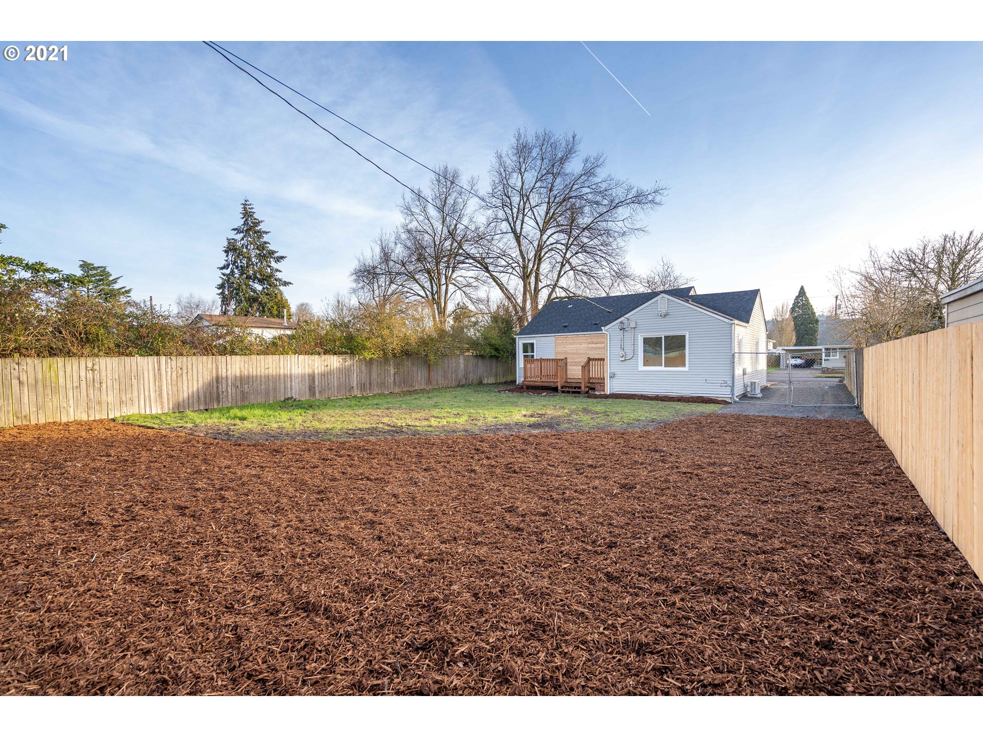 1214 L Street Springfield, OR 97477 - Photo 24 of 24 a view of a house with a yard
