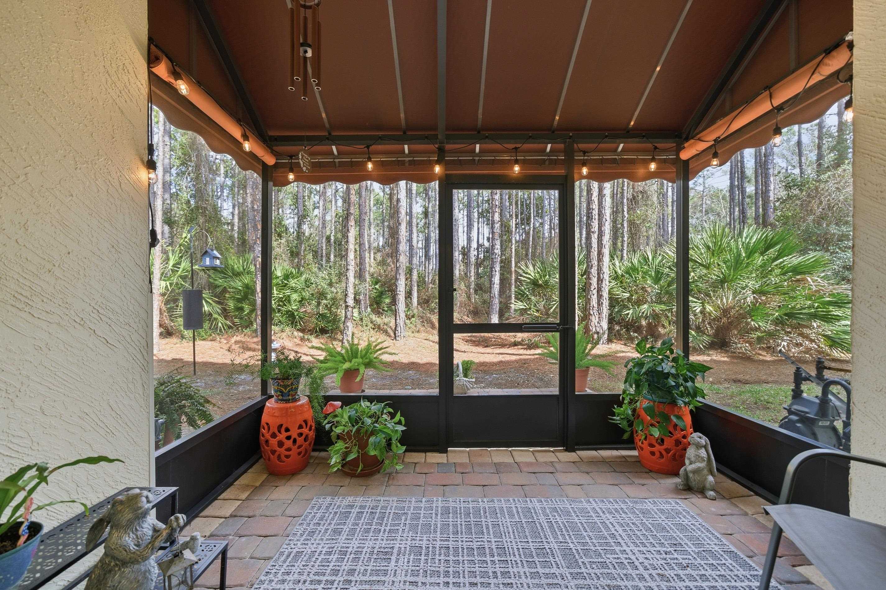200 Grand Ravine Drive St. Augustine, FL 32086 - Photo 12 of 34 Sunroom featuring vaulted ceiling