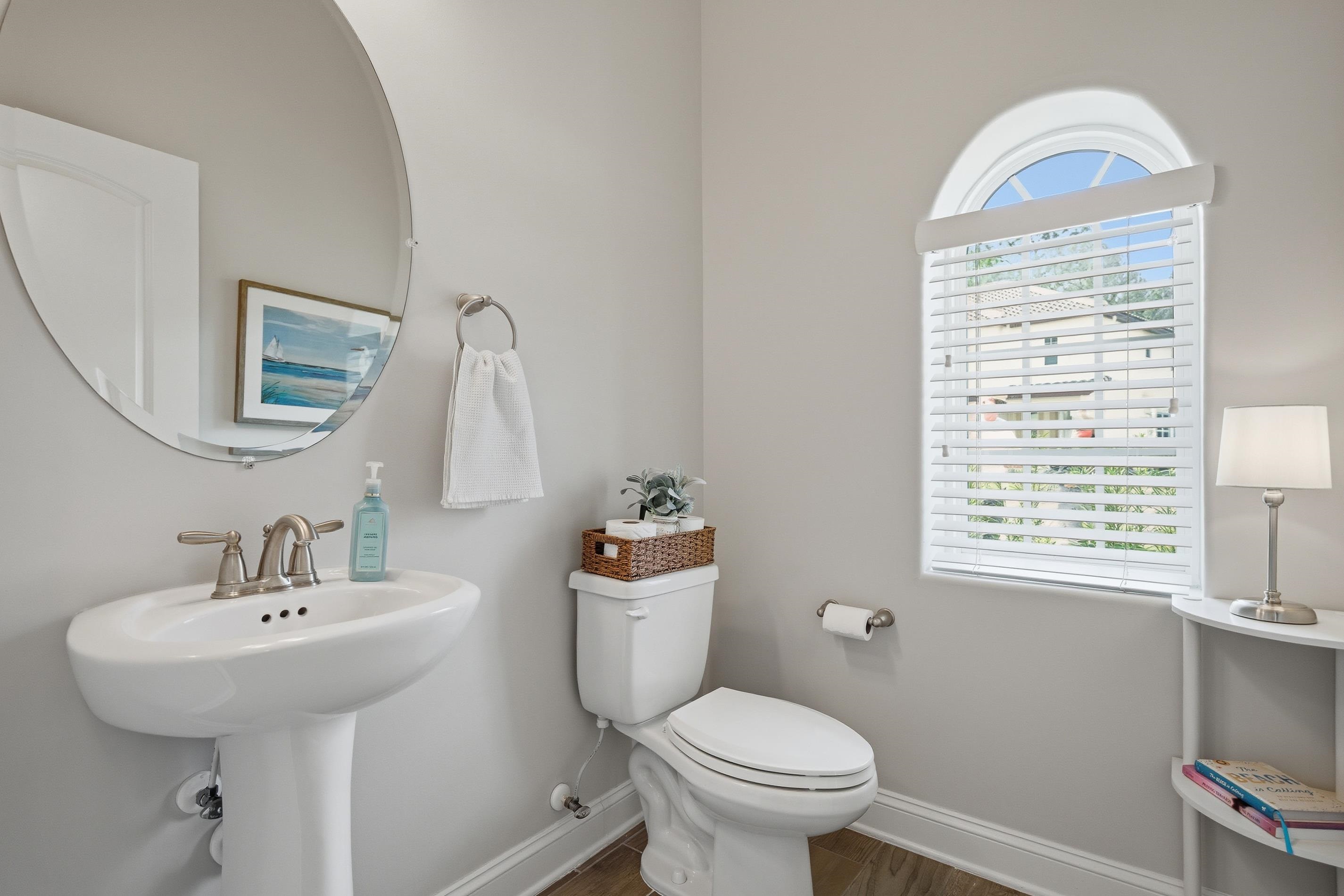 200 Grand Ravine Drive St. Augustine, FL 32086 - Photo 24 of 34 Bathroom featuring plenty of natural light and wood finished floors