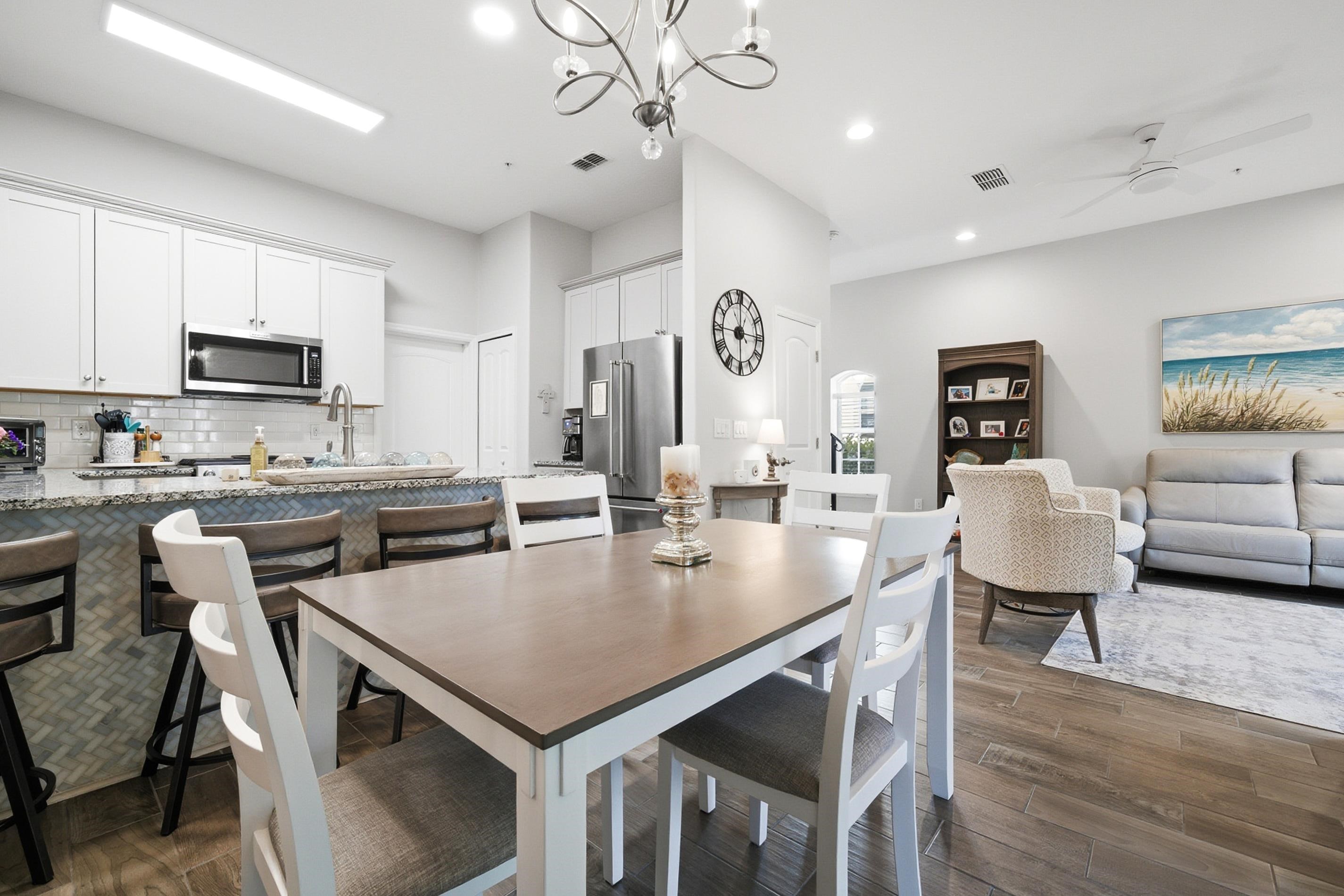 200 Grand Ravine Drive St. Augustine, FL 32086 - Photo 10 of 34 Dining space with dark wood-type flooring, ceiling fan, and hanging lights