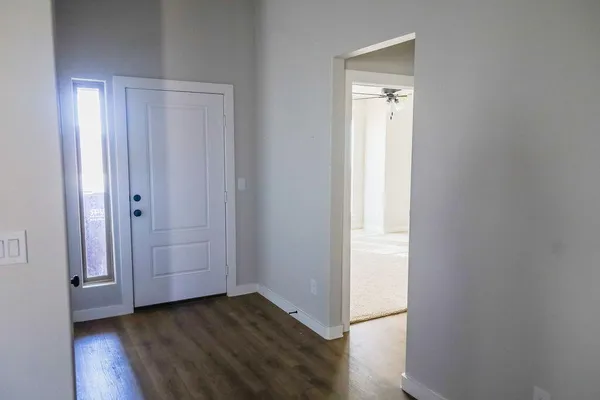 a bathroom with a glass shower door