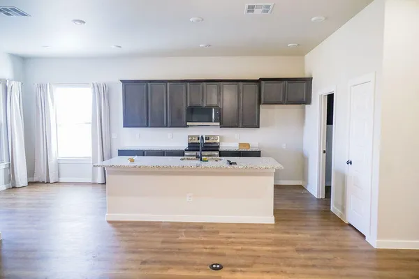a bathroom with a bathtub and a toilet