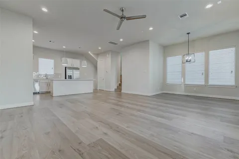 a view of a living room and entryway