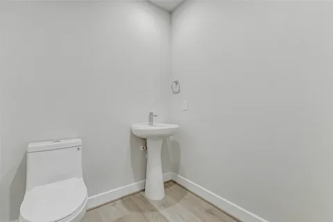 a bathroom with a sink and a toilet