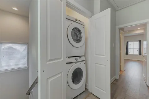 a view of storage and utility room with washer and dryer