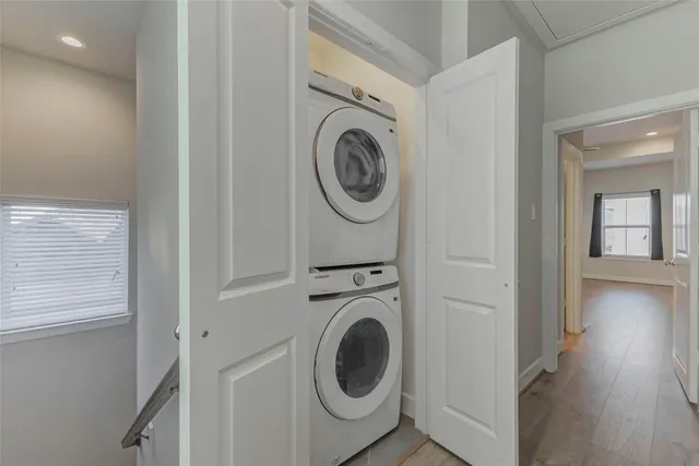 a view of storage and utility room with washer and dryer