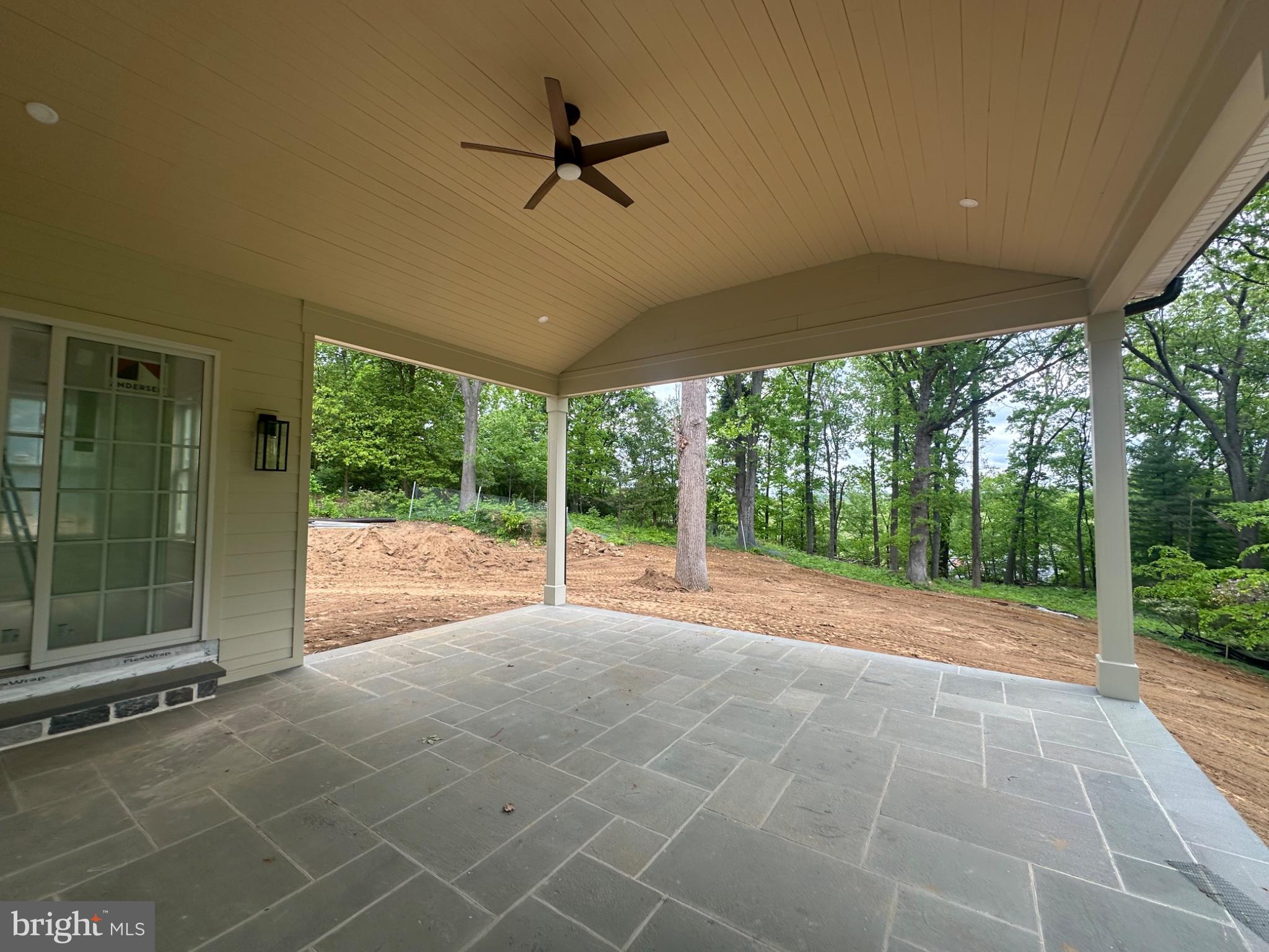 353 Oak Terrace Wayne, PA 19087 - Photo 2 of 13 a view of a livingroom with a ceiling fan and a porch