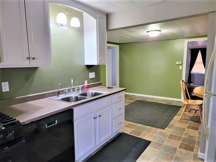 1784 Mound Hill Road Dixon, IL 61021 - Photo 7 of 17 a kitchen with a sink cabinets and utility