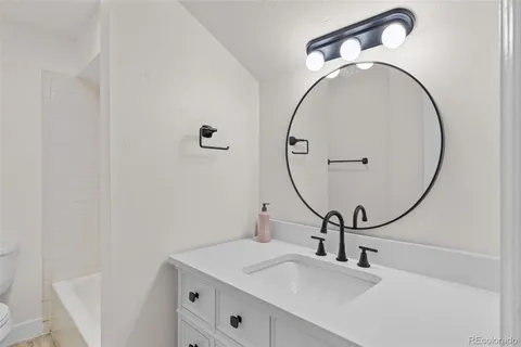 a bathroom with a bathtub