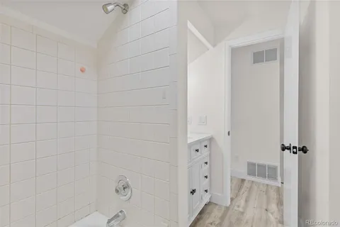a view of a hallway with washer and dryer
