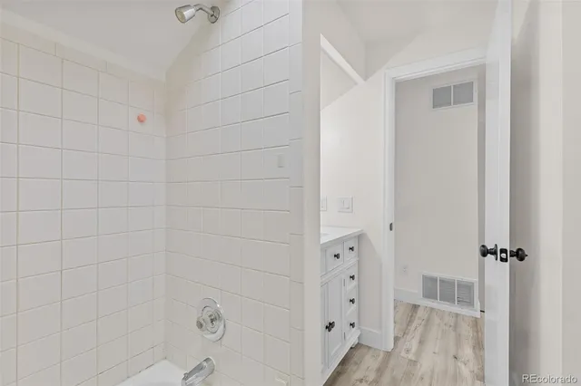 a view of a hallway with washer and dryer