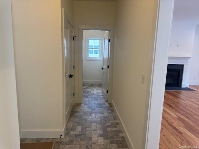 Lot #9 Colonels Path Manorville, NY 11949 - Photo 7 of 26 a view of a hallway with wooden floor and closet