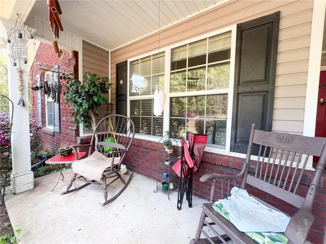 a view of porch with seating area
