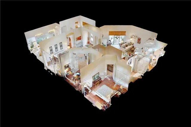 a picture of bed with wooden floor