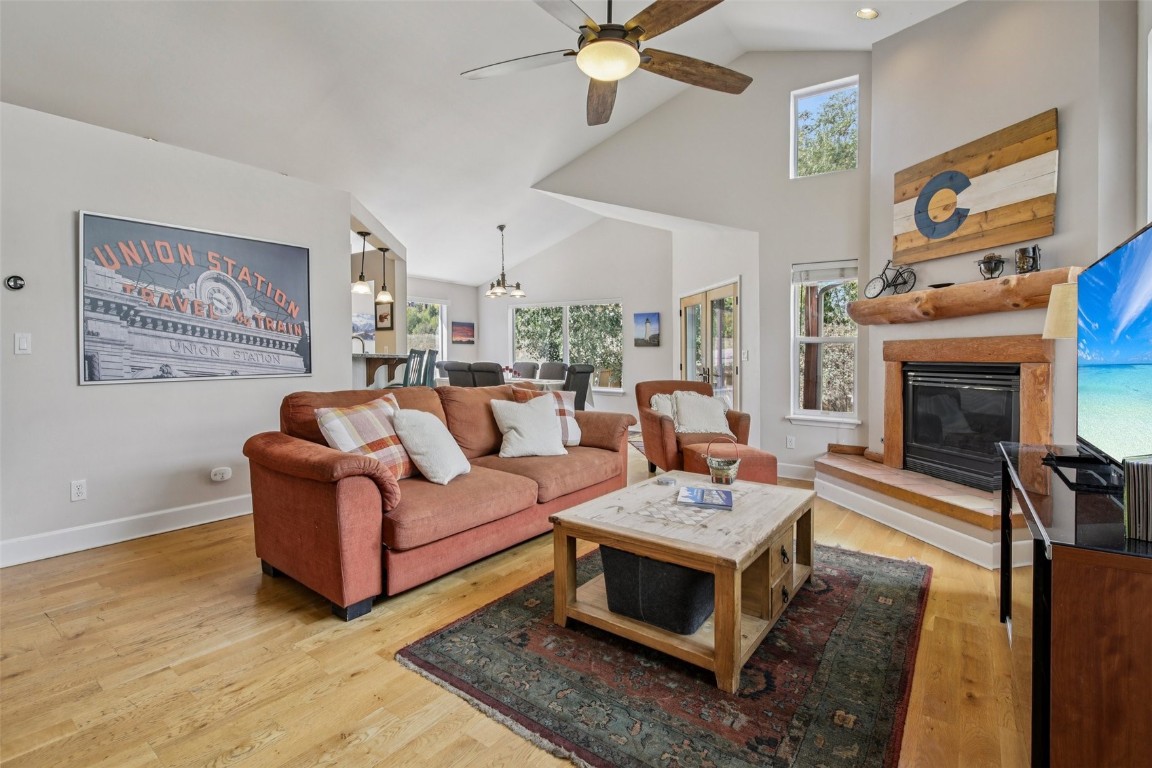 147 Blue Grouse Lane Silverthorne, CO 80498 - Photo 1 of 50 a living room with furniture and a fireplace