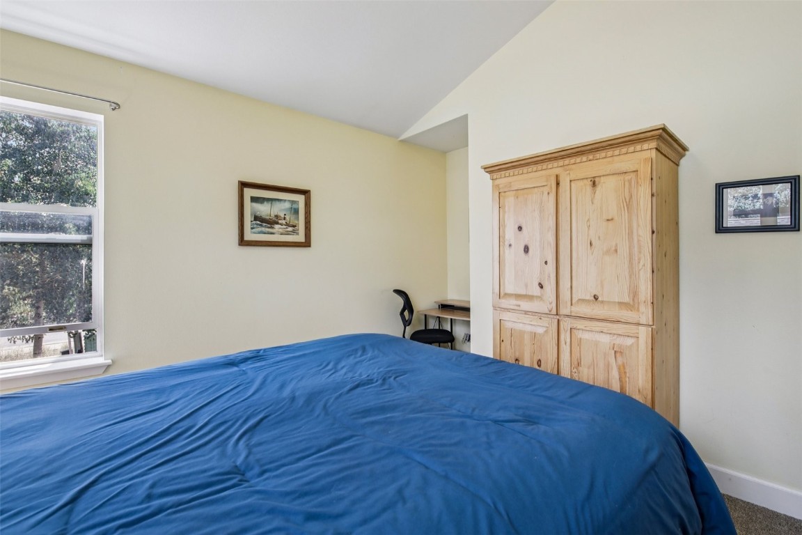 147 Blue Grouse Lane Silverthorne, CO 80498 - Photo 34 of 50 a bed room with a bed and a window