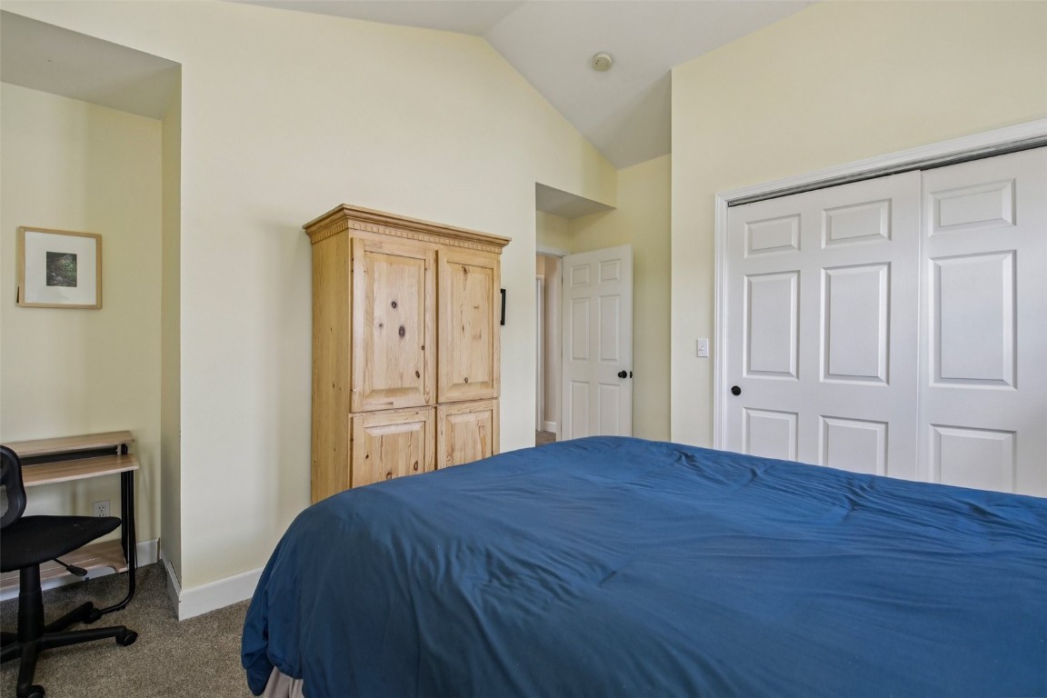 147 Blue Grouse Lane Silverthorne, CO 80498 - Photo 35 of 50 a bedroom with a bed and a closet