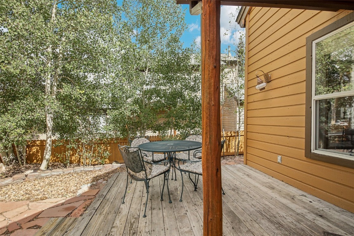 147 Blue Grouse Lane Silverthorne, CO 80498 - Photo 37 of 50 a view of balcony with wooden floor and outdoor seating