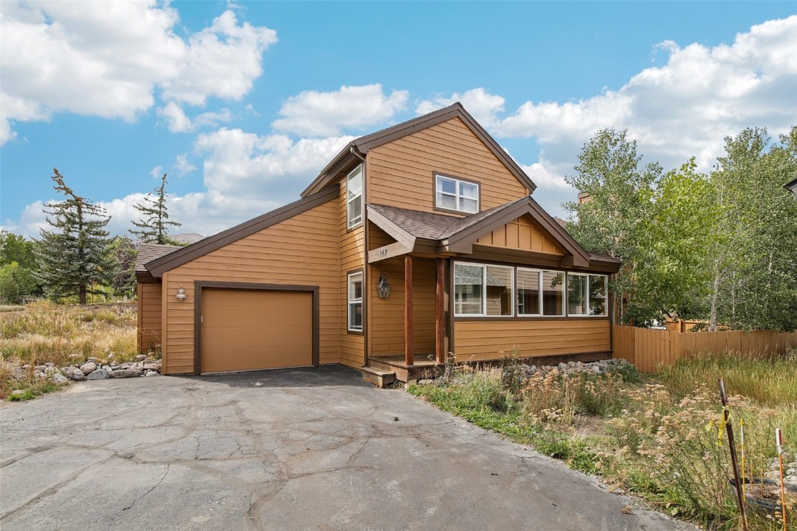 147 Blue Grouse Lane Silverthorne, CO 80498 - Photo 42 of 50 a view of a house with a yard