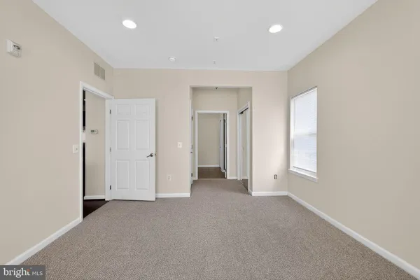 an empty room with window