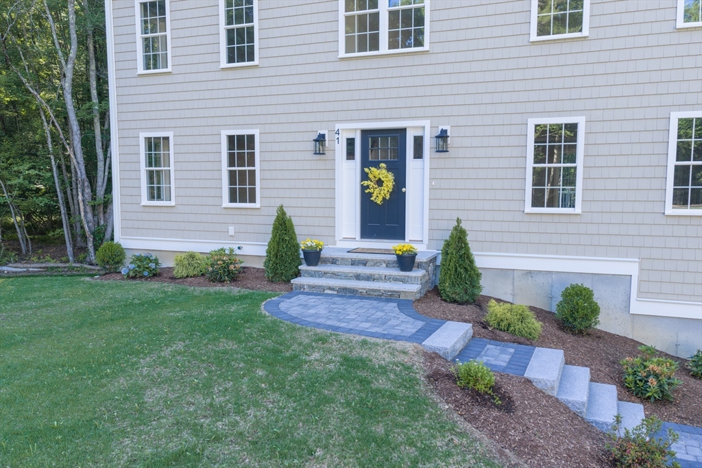 41 Martin Road Douglas, MA 01516 - Photo 7 of 40 a front view of a house with garden