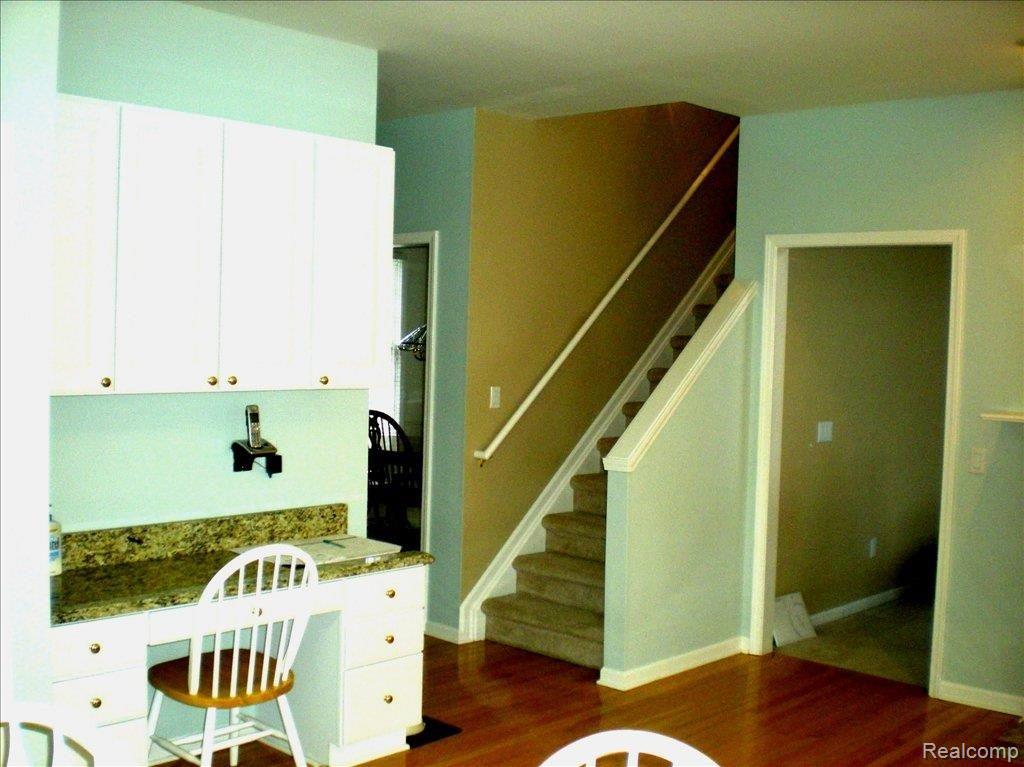 714 Loggers Circle Rochester, MI 48307 - Photo 12 of 21 Kitchen desk & back stairs