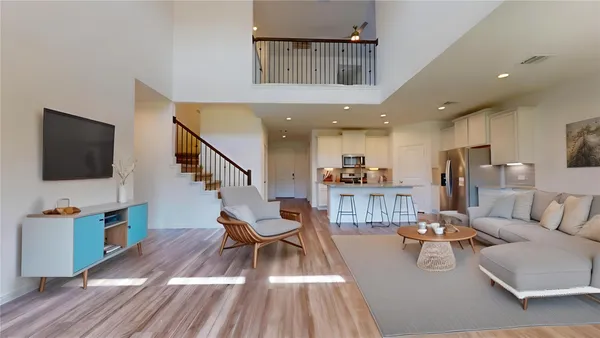 a view of kitchen with cabinets and wooden floor