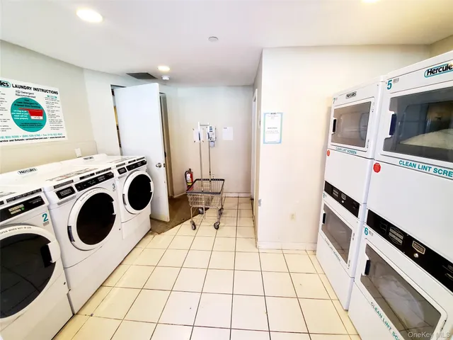 a view of a swimming pool with a lounge chair