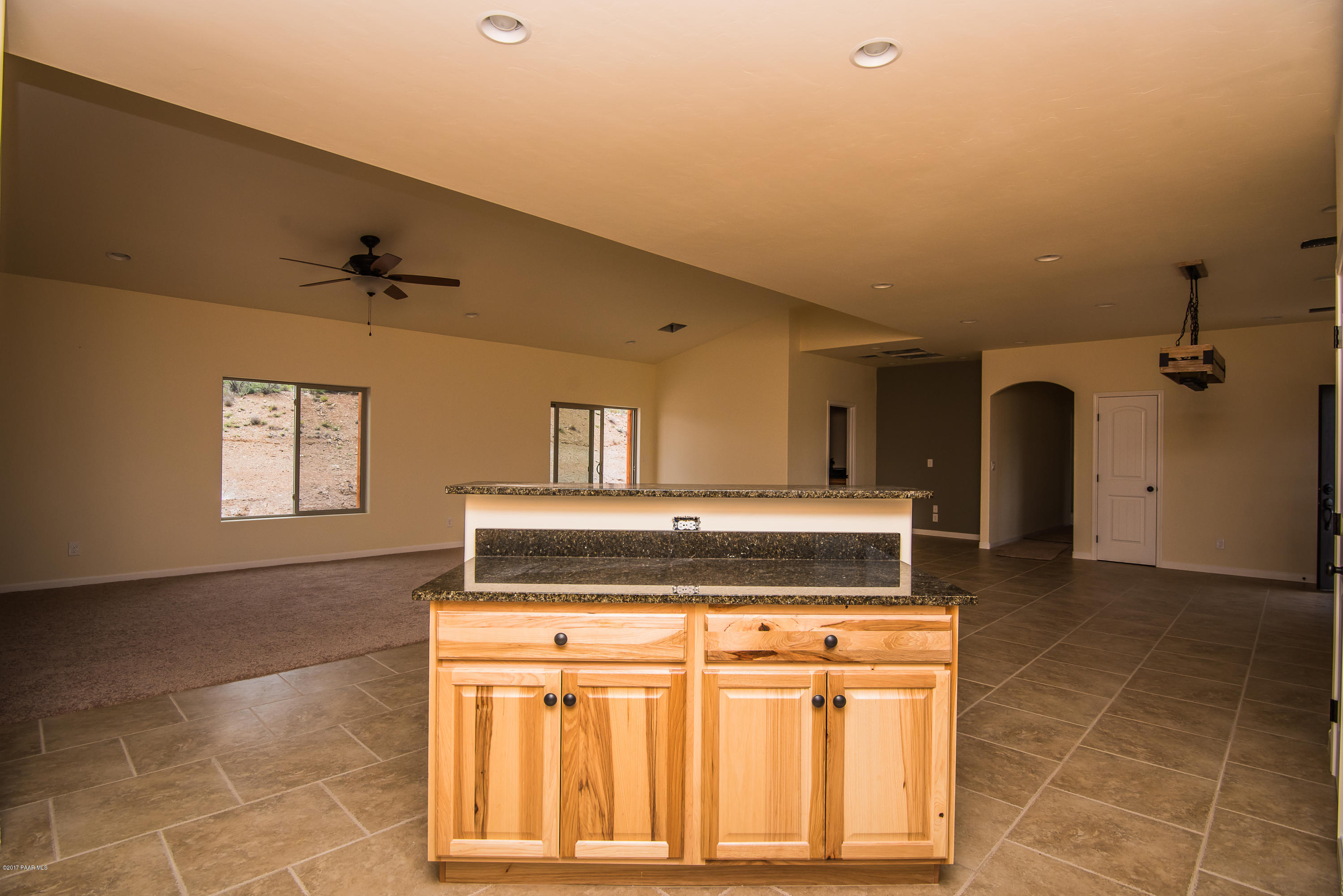 14350 East Blue Ridge Road Dewey-Humboldt, AZ 86327 - Photo 7 of 25 Great Room and Kitchen Island