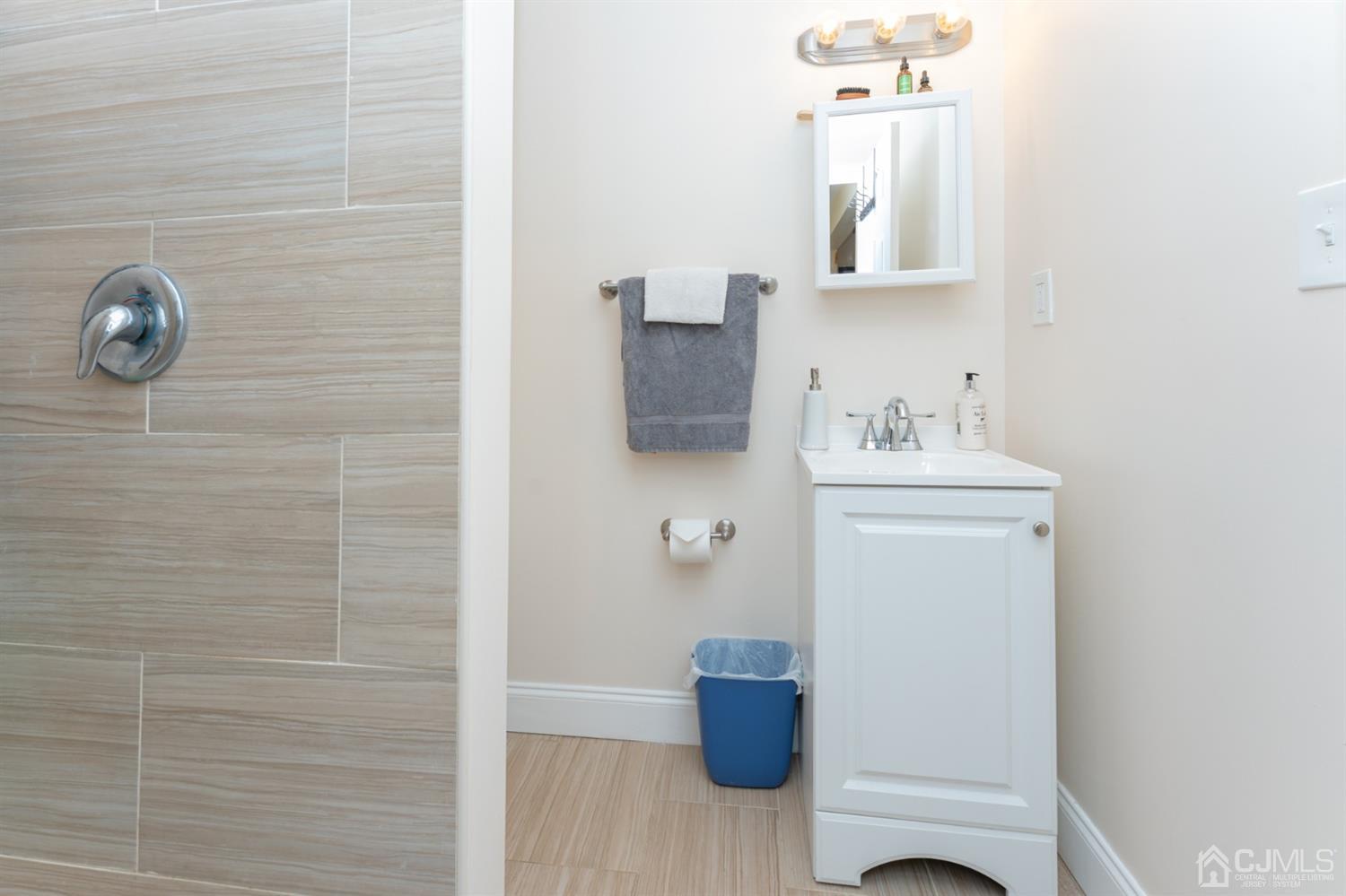 109 Stone Road Union Beach, NJ 07735 - Photo 12 of 21 a bathroom with a toilet and a sink
