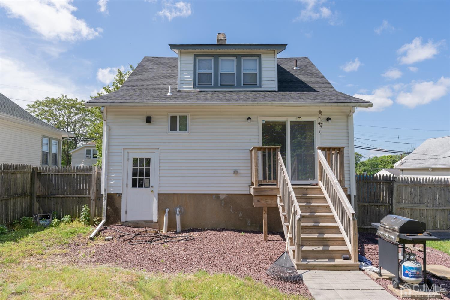 109 Stone Road Union Beach, NJ 07735 - Photo 20 of 21 a front view of a house with garage