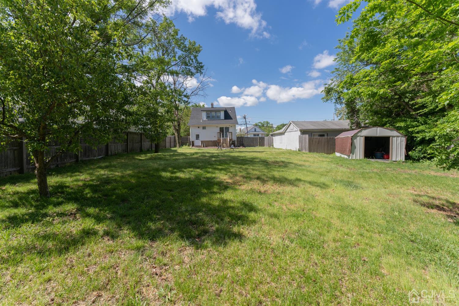 109 Stone Road Union Beach, NJ 07735 - Photo 21 of 21 a house view with a garden space