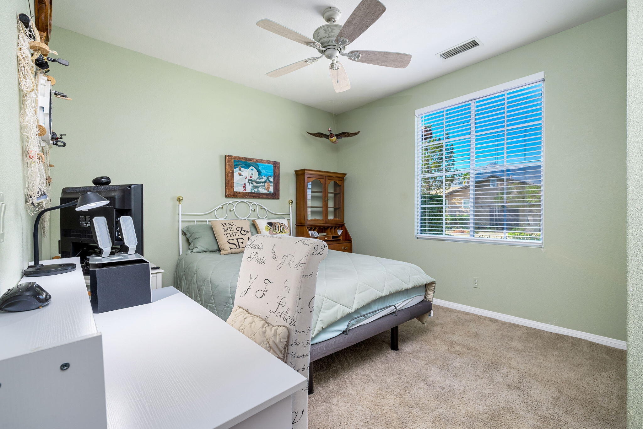 60246 Sweetshade Lane La Quinta, CA 92253 - Photo 26 of 76 a living room with furniture and a window