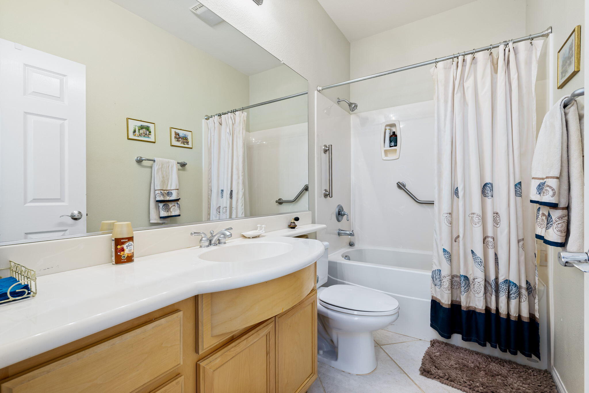 60246 Sweetshade Lane La Quinta, CA 92253 - Photo 27 of 76 a bathroom with a sink a toilet and shower