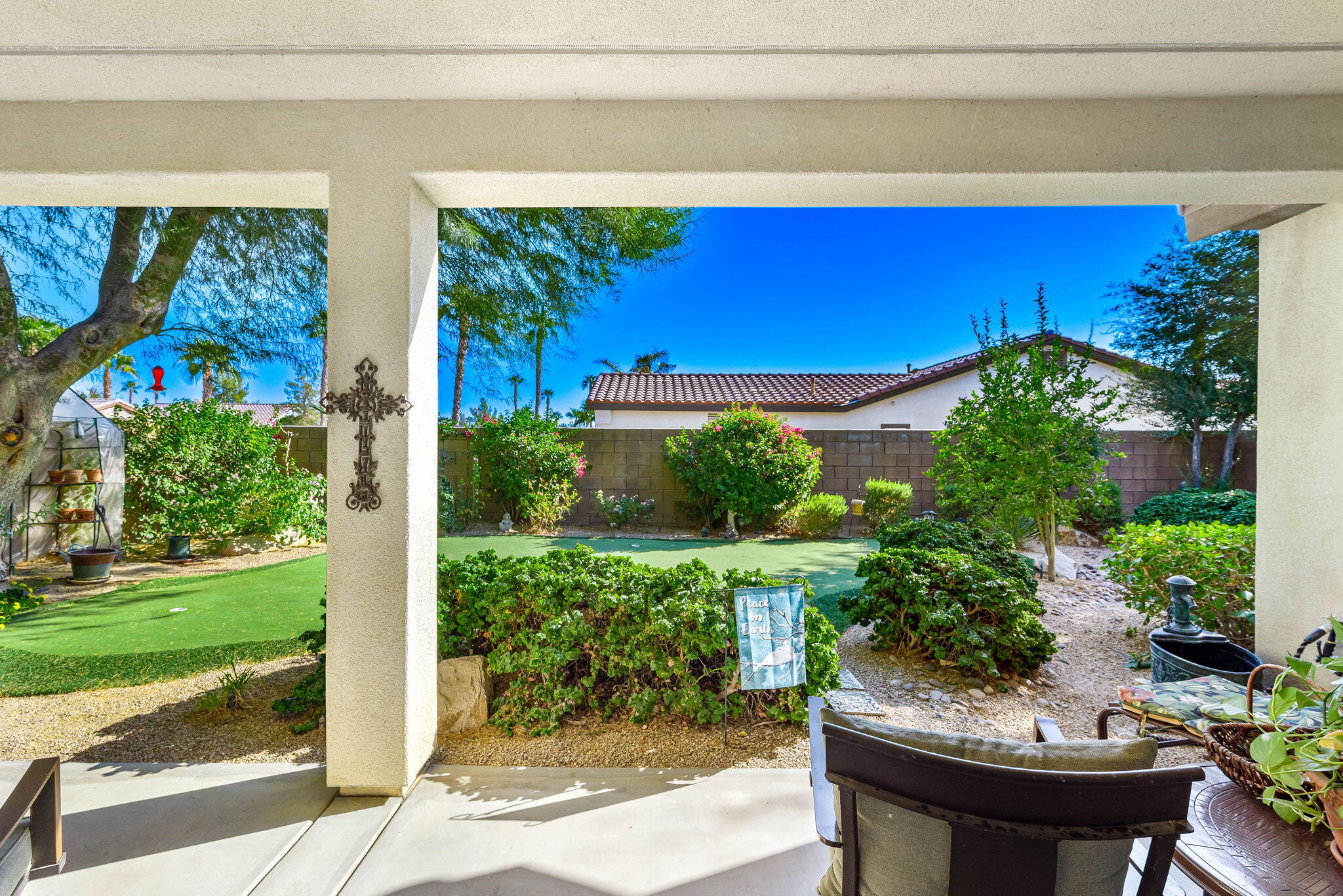 60246 Sweetshade Lane La Quinta, CA 92253 - Photo 29 of 76 a view of a chairs and table in a yard