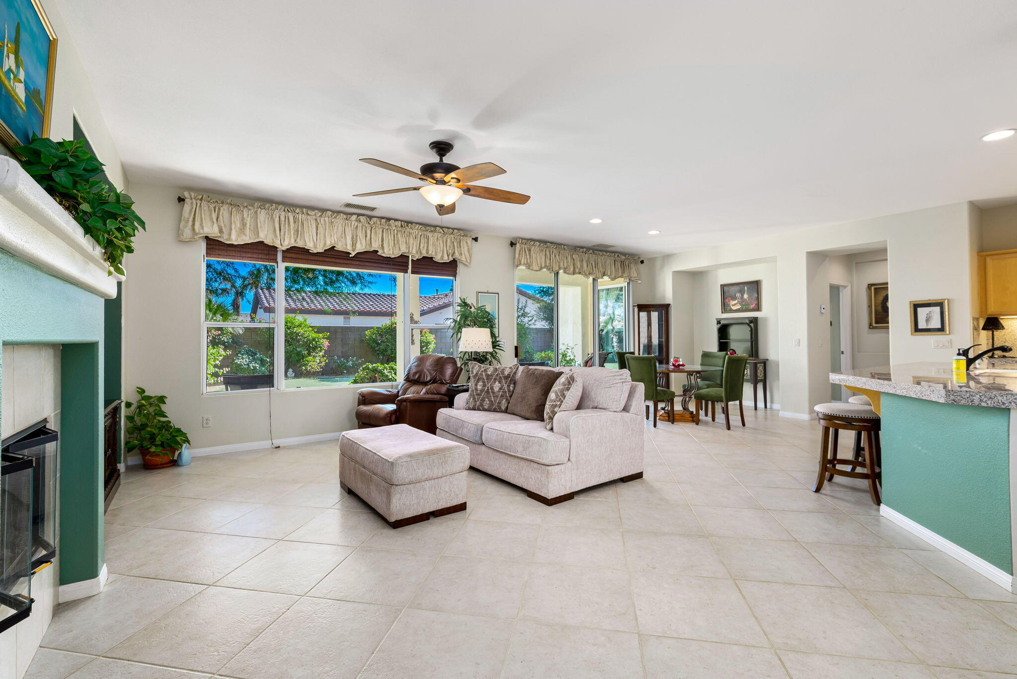 60246 Sweetshade Lane La Quinta, CA 92253 - Photo 8 of 76 a living room with furniture and a large window
