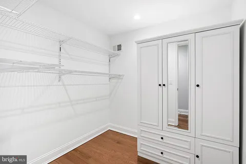a view of an empty walk in closet
